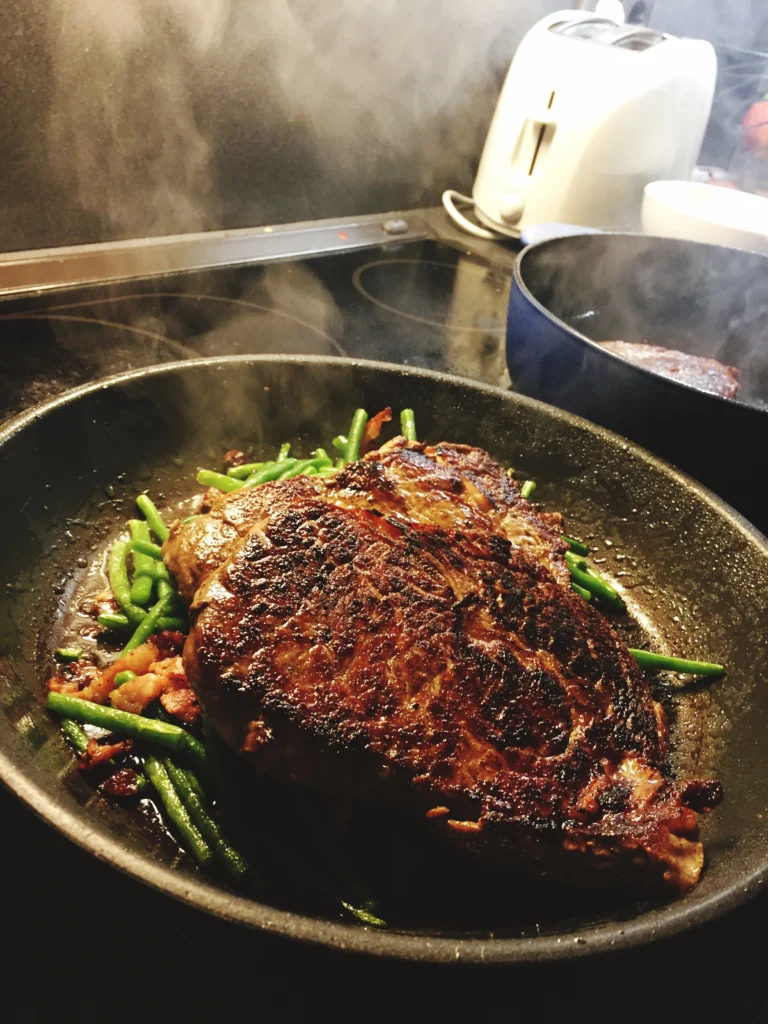 Juicy, tender rib eye roast served with roasted vegetables and herbs on a rustic platter
