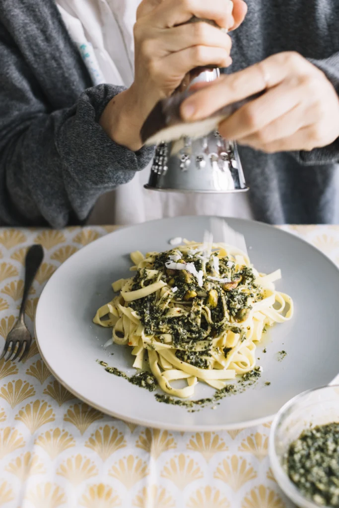 Creamy Boursin cheese pasta topped with herbs and freshly ground black pepper.