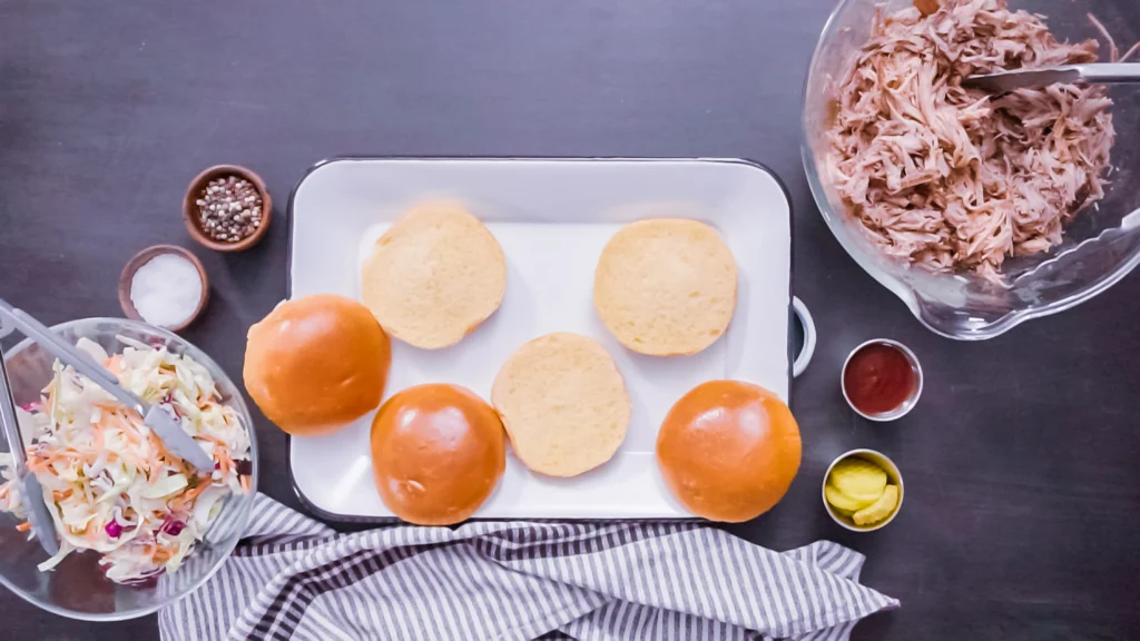 Delicious homemade chicken sliders served with fresh toppings and a side of crispy fries