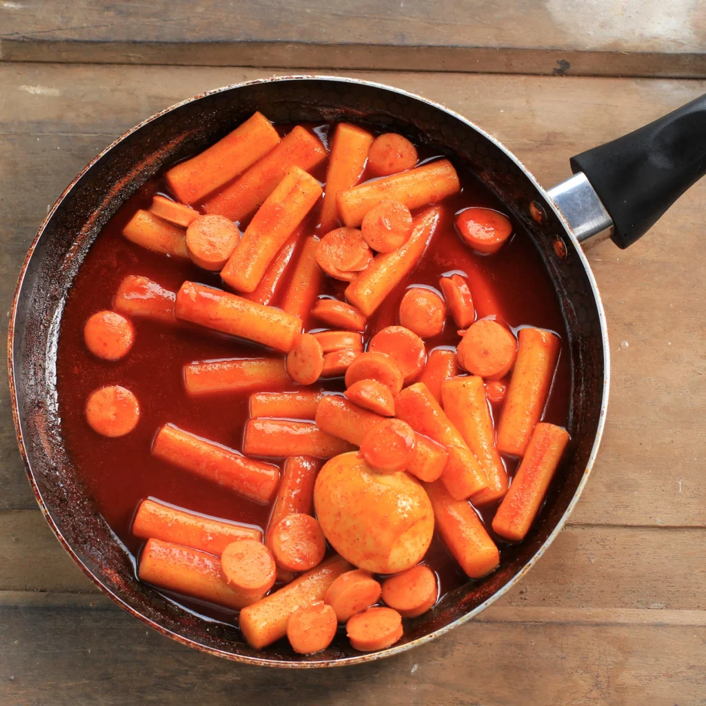 Homemade canned carrots in glass jars, ready for storage