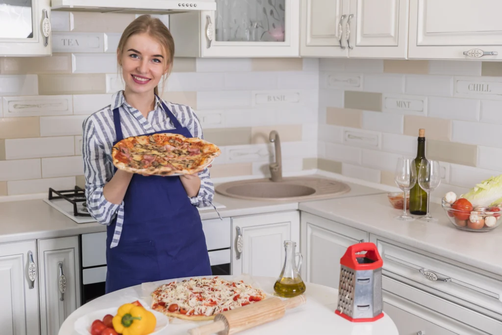 Low-carb chicken pizza crust with toppings of cheese and vegetables