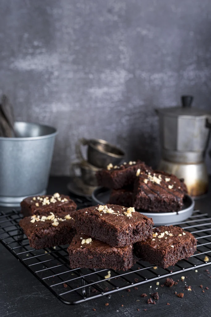 Freshly baked weed brownies on a plate with a rich chocolate topping
