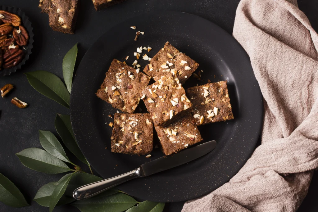 Freshly baked weed brownies on a plate with a rich chocolate topping