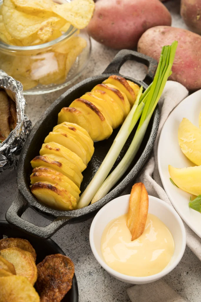 Creamy holiday party potatoes casserole topped with golden crunchy cornflakes served in a festive baking dish