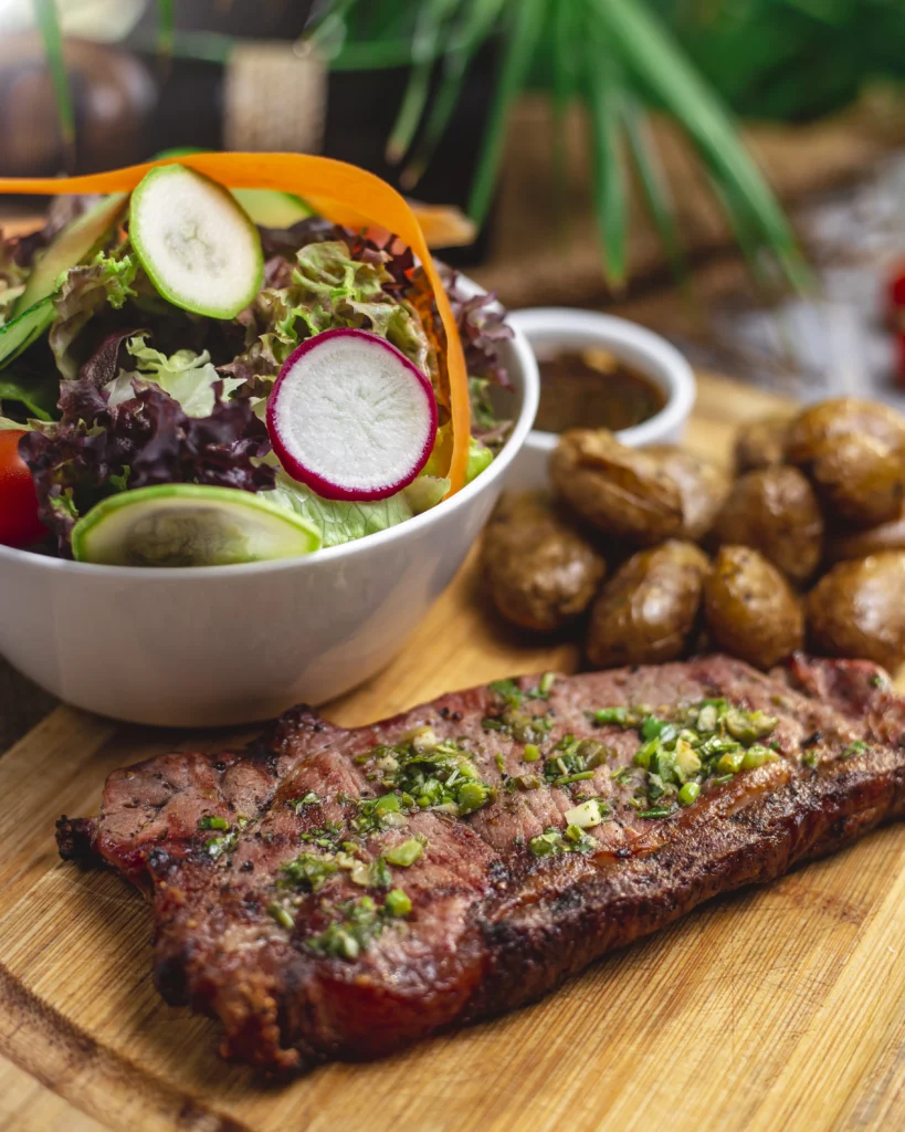 Flank steak marinated in classic, spicy, and Asian-inspired sauces ready for grilling