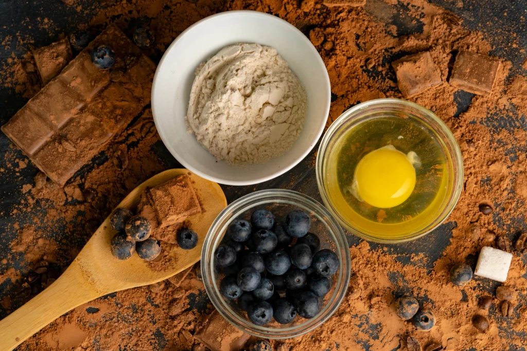Freshly baked homemade blueberry rustic crumble with oats, served warm in a baking dish
