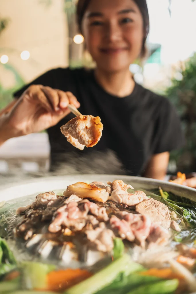 Easy Korean Beef Recipe served with rice and green onions.