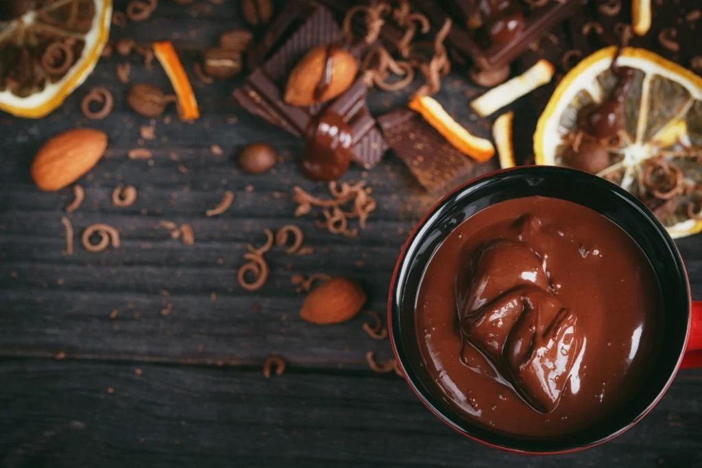 Chocolate Ganache Recipe
Homemade chocolate ganache being poured over a cake, made with rich dark chocolate and cream