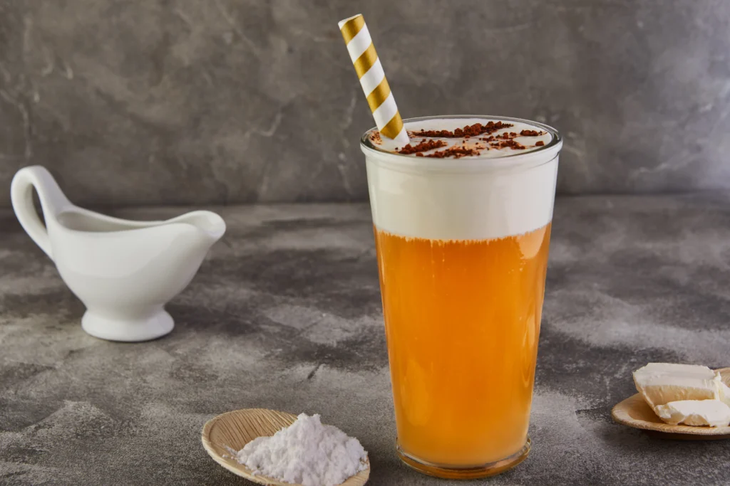 Butterbeer Recipe
A frothy glass of homemade magical Butterbeer topped with whipped cream and caramel drizzle, inspired by the Harry Potter series.