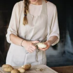 Warm German potato salad with bacon, onions, and fresh parsley in Grandma’s traditional recipe style