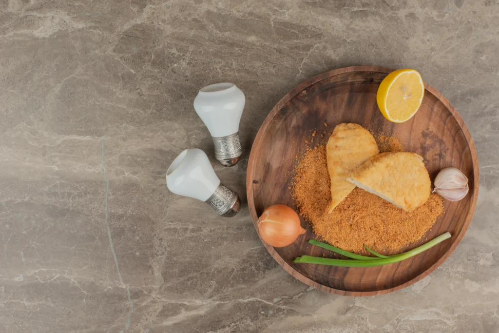 Schnitzel Recipe
Crispy air fryer schnitzel served with lemon wedges and fresh parsley on a plate.