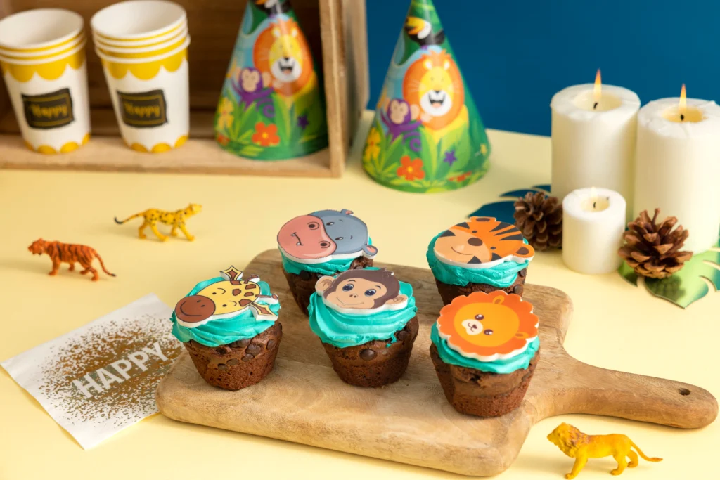 Olympics Chocolate Muffins
Chocolate muffins with colorful Olympic-themed sprinkles on top, perfect for kids.