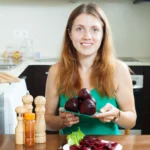 Jar of homemade pickled beets with fresh herbs, easy beginner recipe