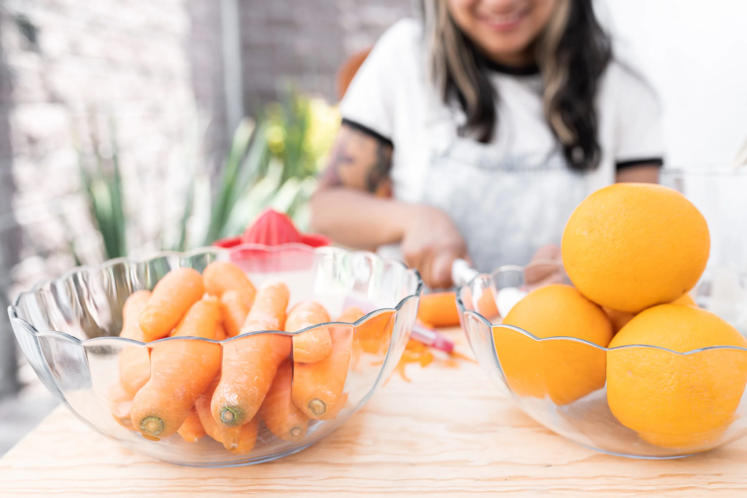Moroccan Carrot & Orange Salad made with fresh carrots, juicy orange slices, olive oil, and Moroccan spices served in a rustic bowl