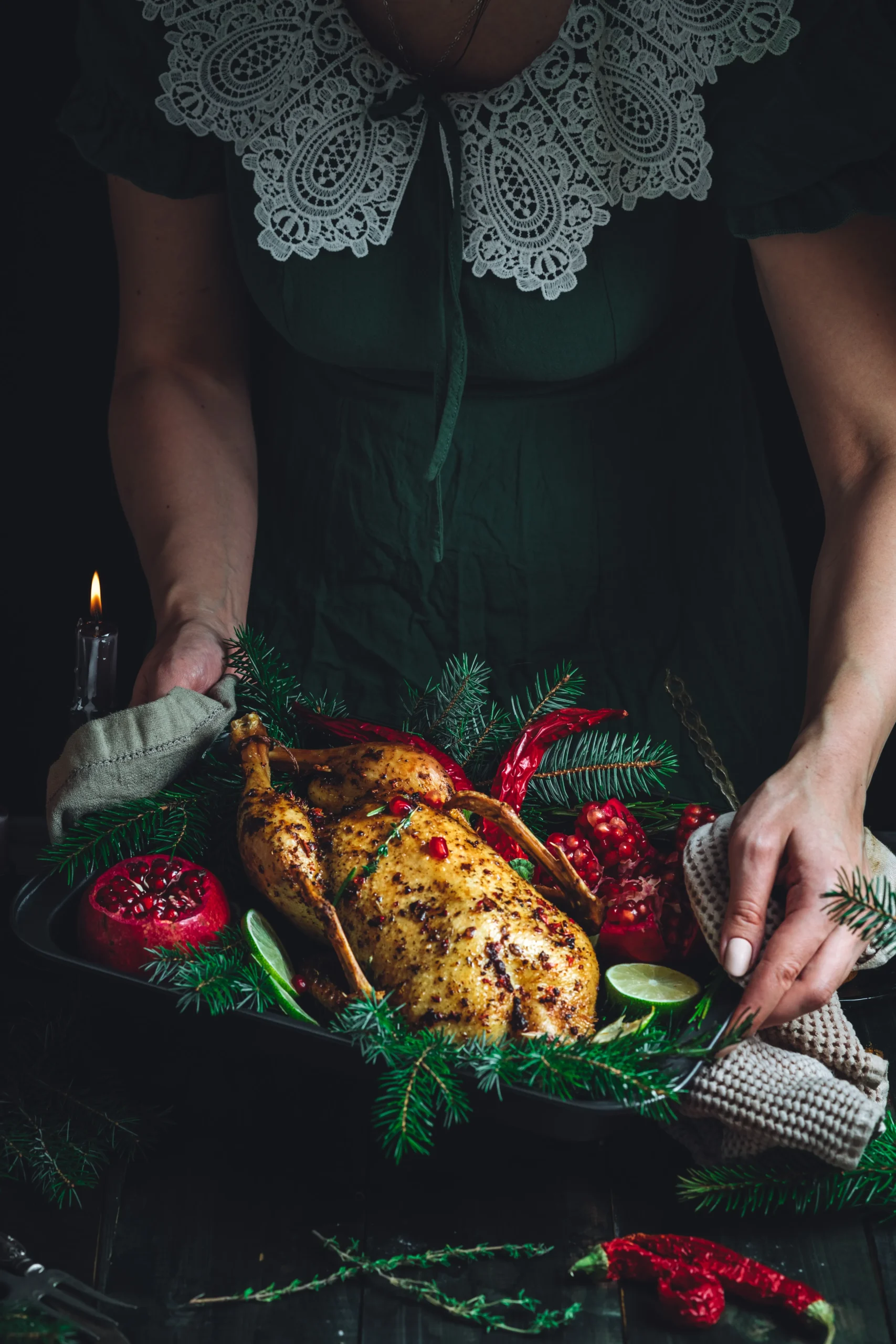 Herb-roasted chicken served with colorful seasonal vegetables on a rustic plate