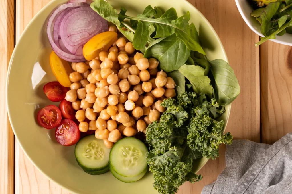 Delicious crispy chickpea and veggie bowl with quinoa, roasted vegetables, and tahini dressing