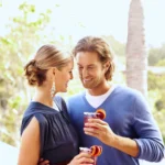 Valentine’s Day Strawberry Prosecco Sparkler cocktail in a champagne flute, garnished with fresh strawberries and a sprig of mint, with soft pink lighting