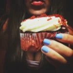 Delicious red velvet cupcakes topped with creamy cream cheese frosting, perfect for Valentine’s Day