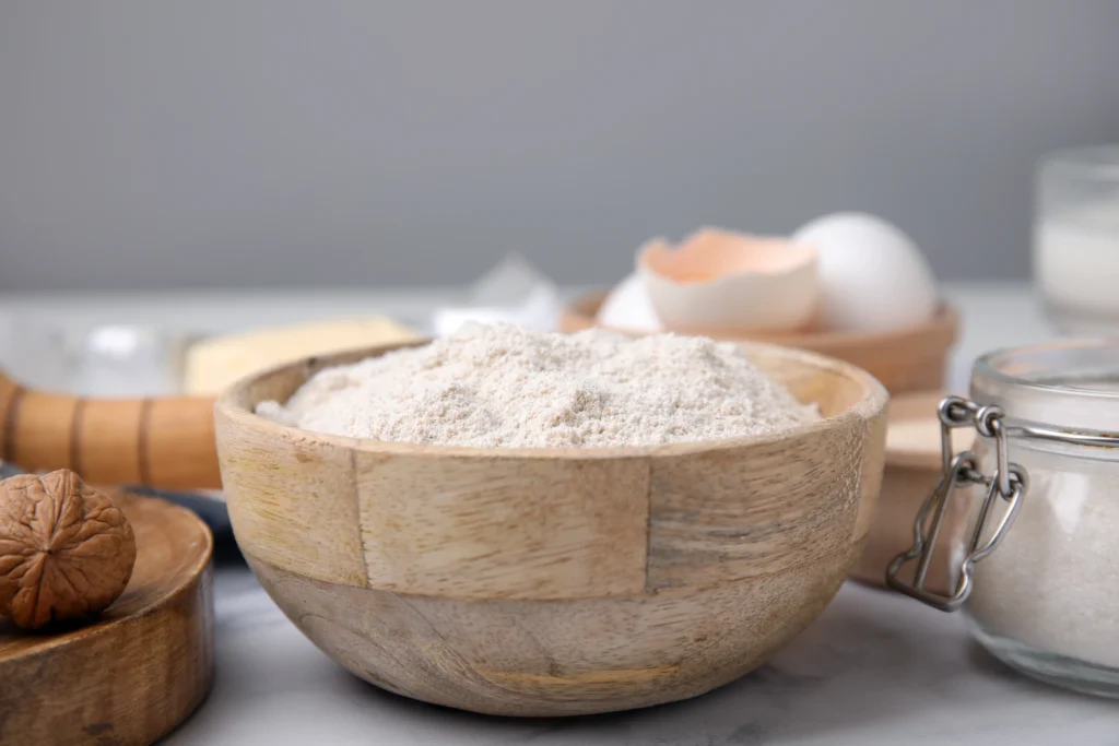 Homemade self-rising flour made with only three ingredients in a mixing bowl