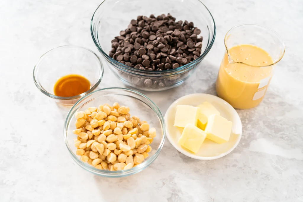 Homemade peanut butter balls coated in chocolate on a plate
