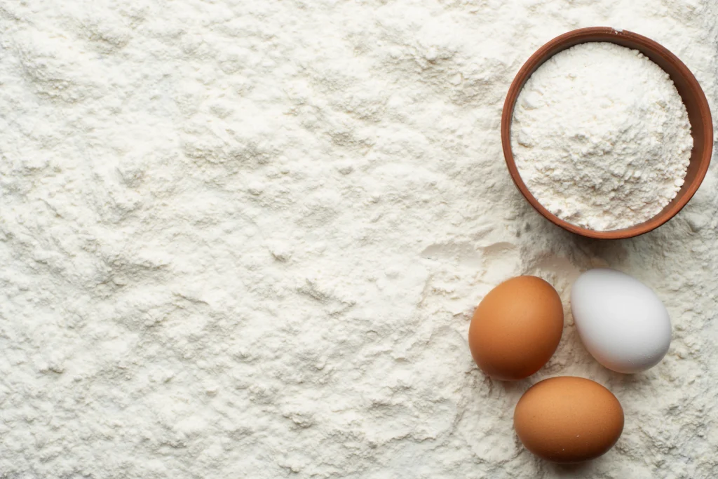 Homemade self-rising flour made with only three ingredients in a mixing bowl