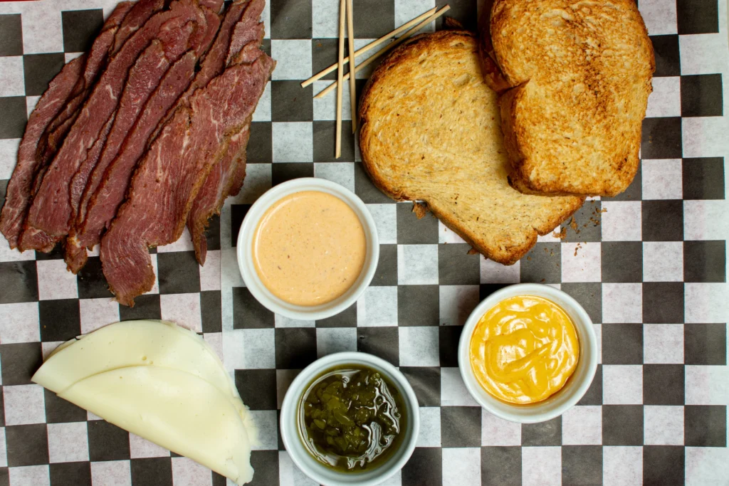 Pastrami Recipe
Delicious quick pastrami sandwich with rye bread, pickles, and mustard ready to serve