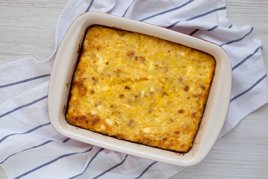 Southern Jiffy Corn Casserole in a golden-baked dish, creamy and cheesy, ready to serve