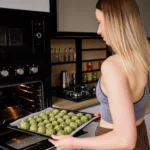 Healthy protein balls made with oats, nut butter, and protein powder, arranged on a plate for meal prep and fitness snacks