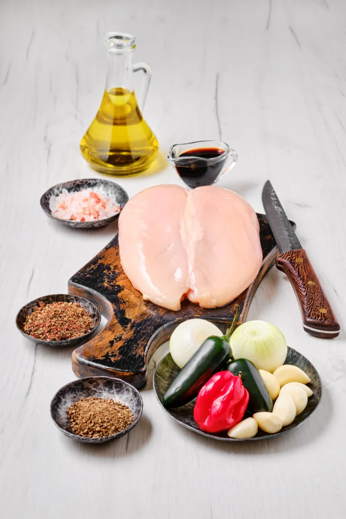 Smoky chipotle chicken served on a plate with lime and fresh herbs for a spicy dinner recipe