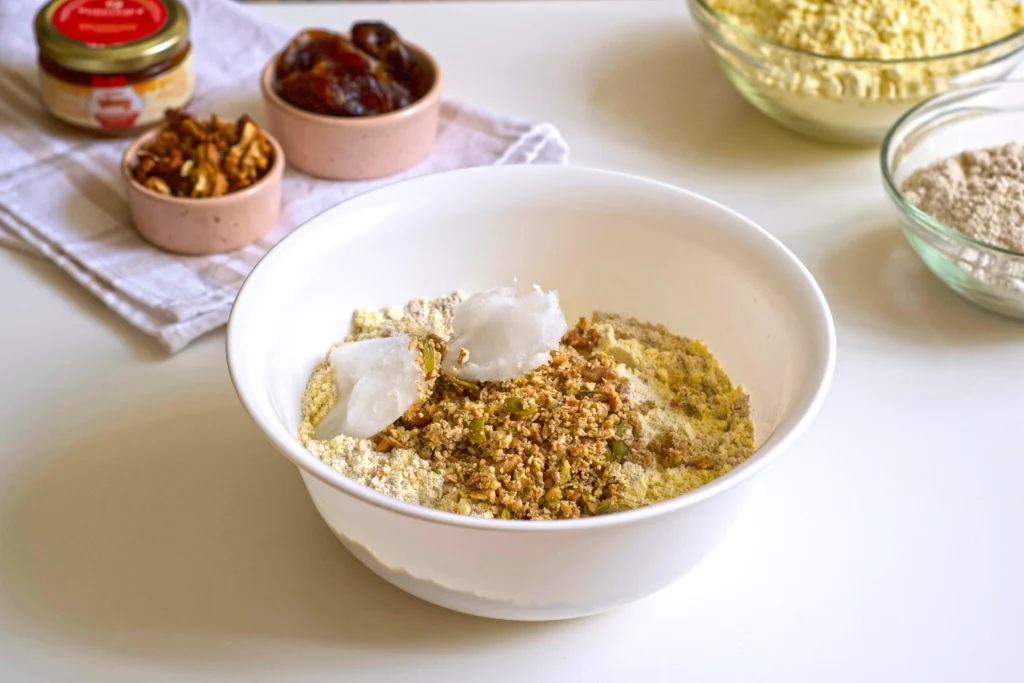 Healthy protein balls made with oats, nut butter, and protein powder, arranged on a plate for meal prep and fitness snacks