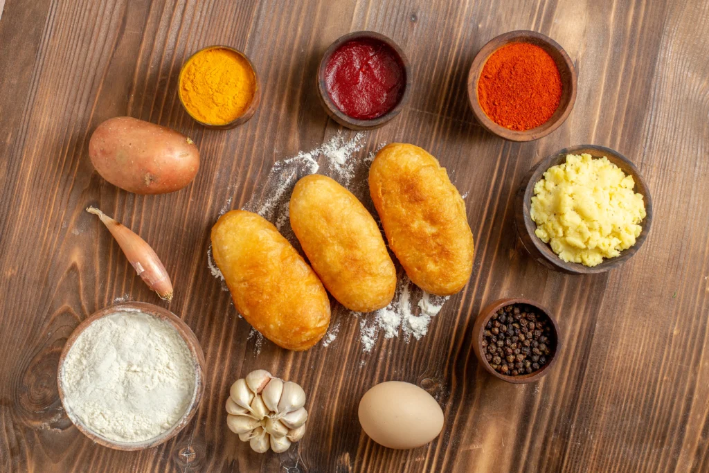 Crispy Hush Puppy
Golden crispy hush puppies served hot with fried fish and lemon wedges on a rustic plate