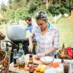 Smoked brisket sliced on a wooden board with a crispy bark and juicy interior, served at a BBQ party