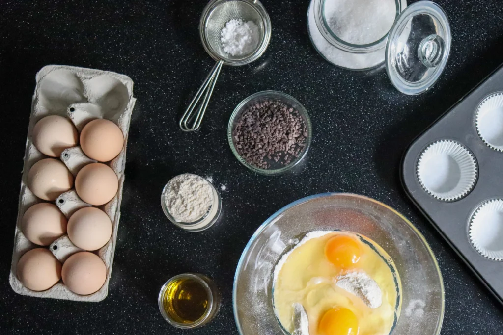 Romantic lava cake with molten chocolate center served on a plate with strawberries and ice cream for a date night dessert