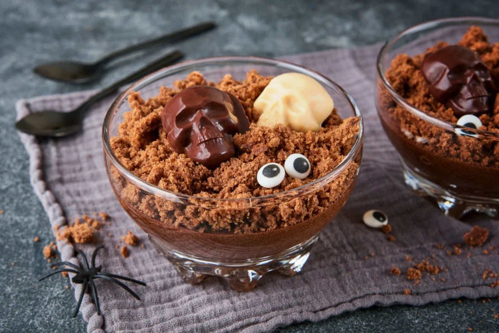 Dirt Pudding Recipe
Dirt Pudding RecipeA fun dirt pudding dessert served in clear cups, layered with creamy chocolate pudding, crushed chocolate cookies, and gummy worms on top.