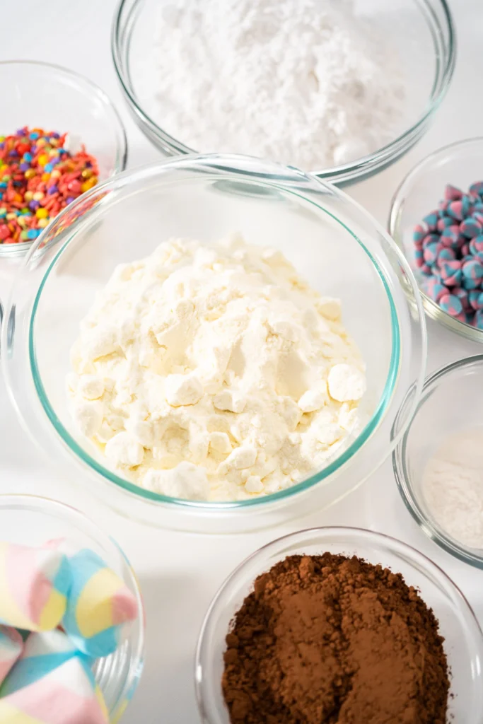 Dirt Pudding Recipe
A fun dirt pudding dessert served in clear cups, layered with creamy chocolate pudding, crushed chocolate cookies, and gummy worms on top.