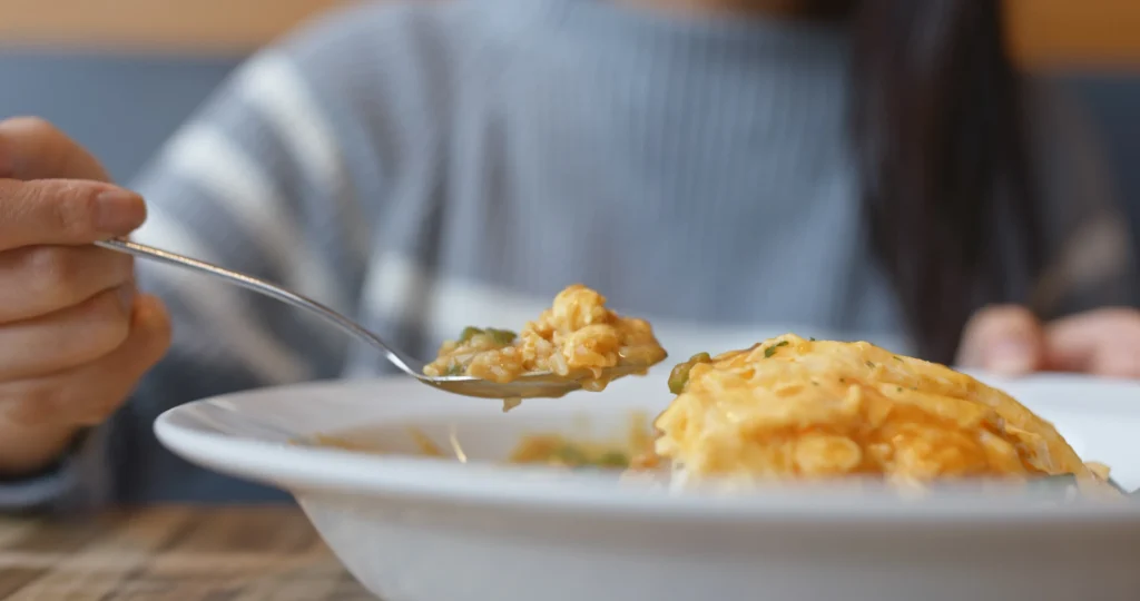 Authentic Puerto Rican mofongo with garlic and fried plantains served with shrimp and avocado