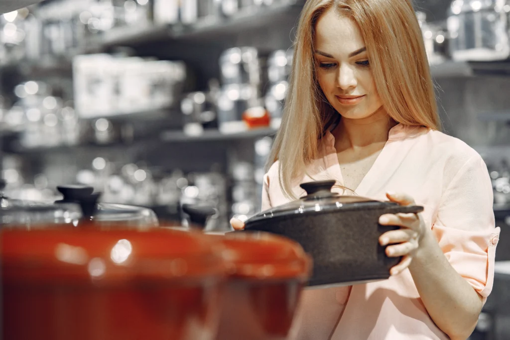Hearty homemade crockpot chili with beans, peppers, and melted cheese served with cornbread