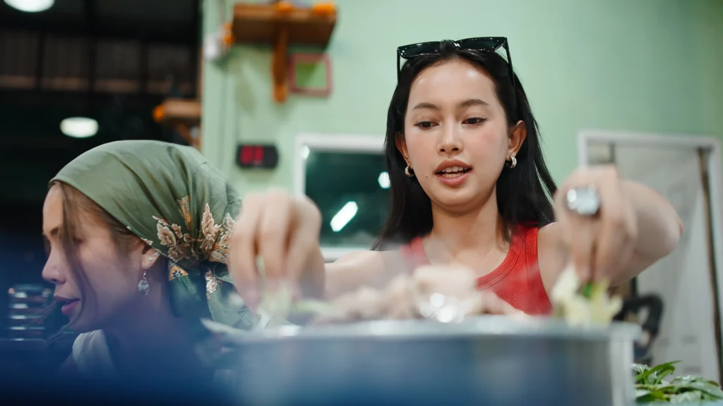 A hearty bowl of classic dirty rice made with ground meat, spices, and vegetables, garnished with fresh parsley for a comforting Southern-style meal.