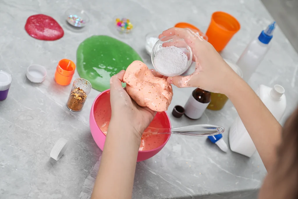 Amazing oobleck recipe showing slime-like non-Newtonian fluid made from cornstarch and water in a bowl