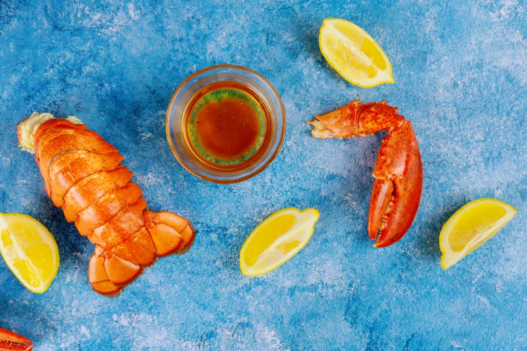 Buttery lobster roll served in a toasted bun with fresh herbs and melted butter
