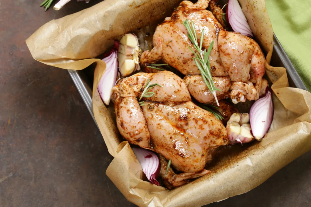 Garlic Herb Cornish Hen
Golden roasted Cornish hen seasoned with garlic and fresh herbs, served on a rustic platter with roasted vegetables for a simple flavorful dinner.