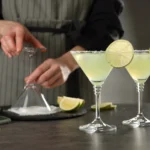 Gimlet recipe cocktail with fresh lime juice served in a chilled glass with lime garnish