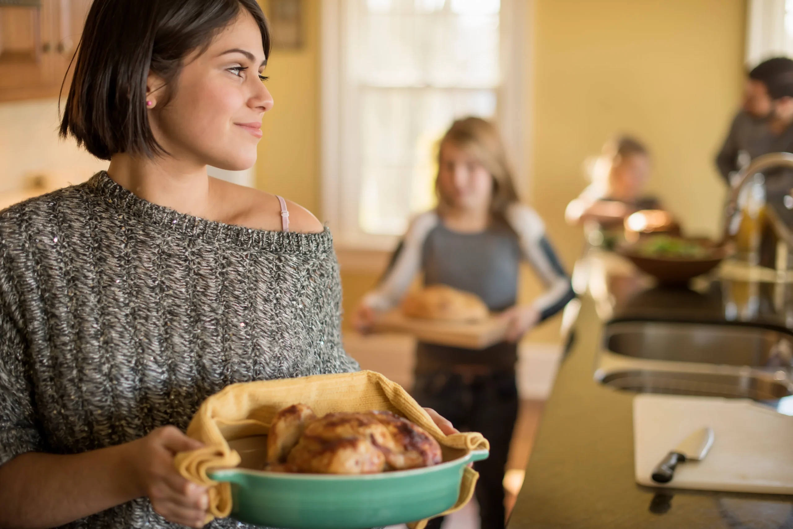 Golden roasted Cornish hen seasoned with garlic and fresh herbs, served on a rustic platter with roasted vegetables for a simple flavorful dinner.