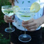 Refreshing skinny margarita recipe in a glass with fresh lime and ice