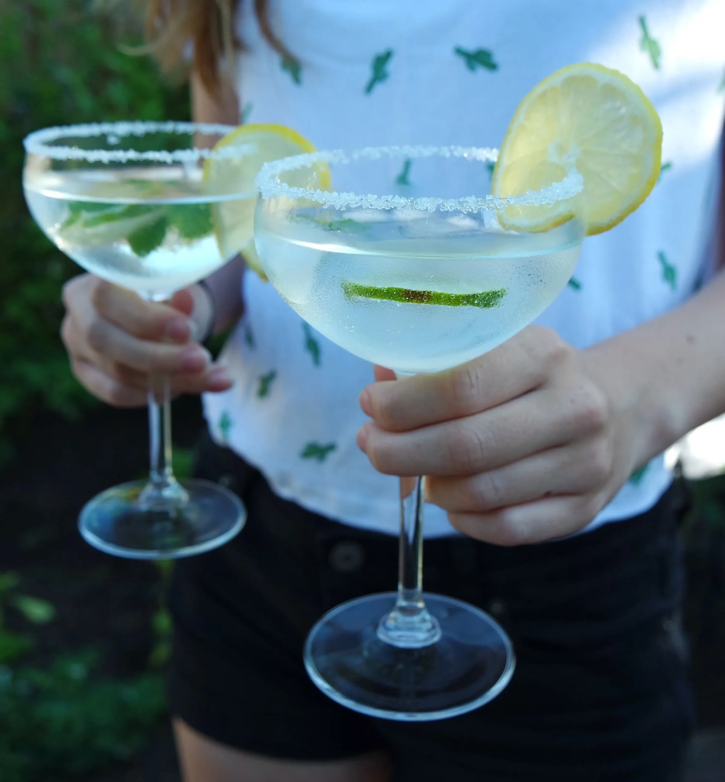 Refreshing skinny margarita recipe in a glass with fresh lime and ice