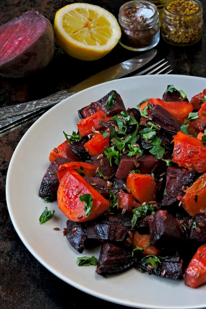 Mediterranean beet salad served with roasted beets, feta cheese, cucumber, red onion, olives, and fresh herbs, drizzled with olive oil and lemon dressing.