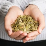 Golden-brown crunchy pumpkin seeds roasted with simple seasonings, served in a rustic bowl and ready for healthy snacking.