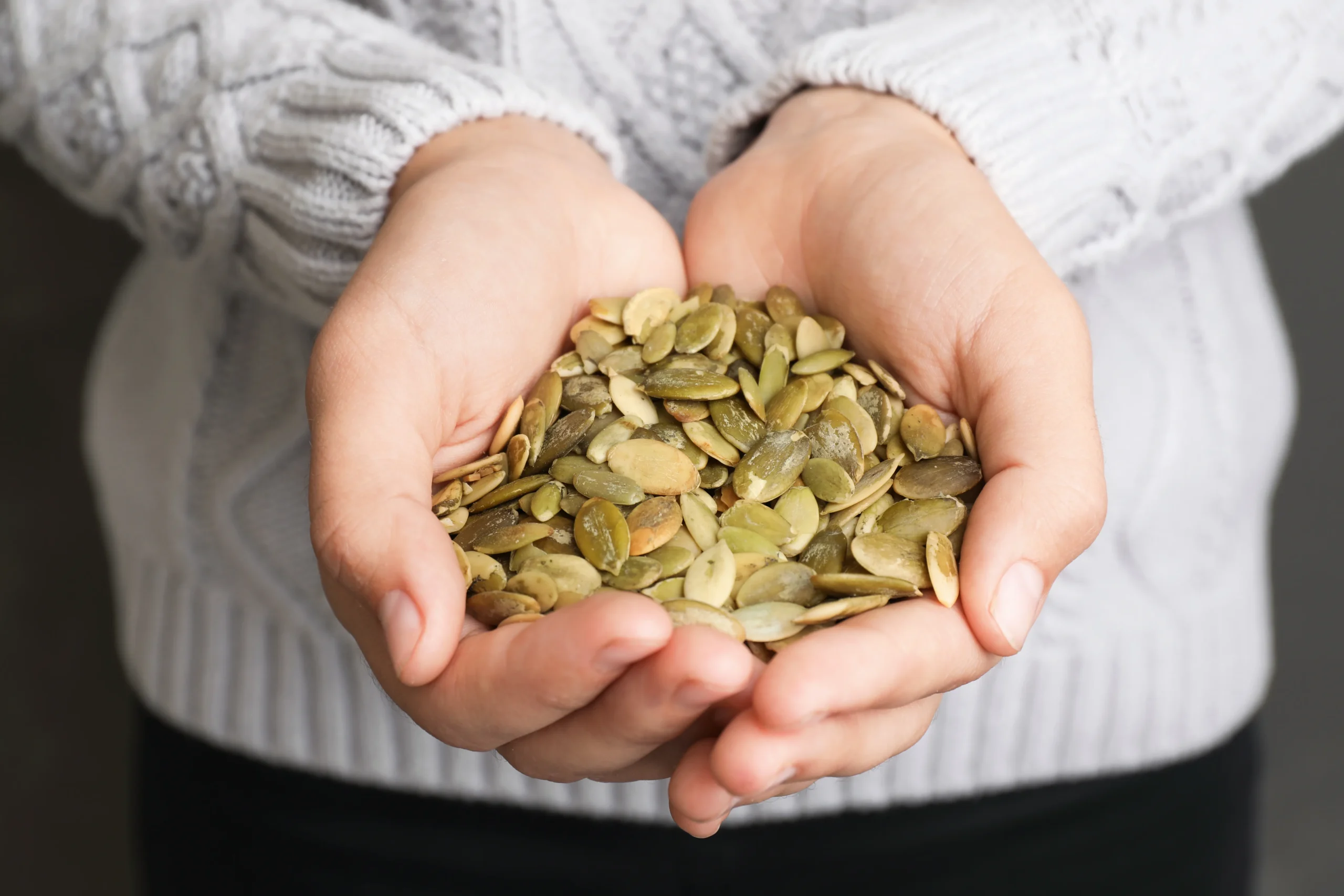 Golden-brown crunchy pumpkin seeds roasted with simple seasonings, served in a rustic bowl and ready for healthy snacking.