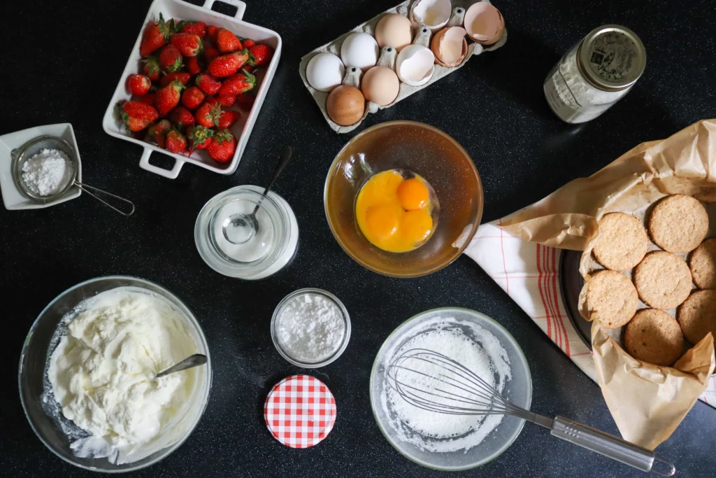 Strawberry Shortcake Recipe
Homemade strawberry shortcake with fluffy biscuits, fresh sliced strawberries, and whipped cream served on a white dessert plate.