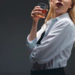 Perfect Classic Old Fashioned Cocktail Recipe with bourbon, orange peel, and ice in a whiskey glass